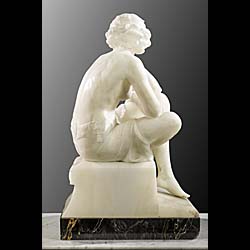  A fine statuary marble Art Deco figure of a young lady  