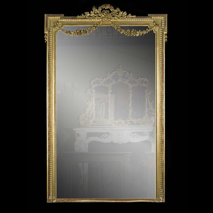 A Tall French Gilded Overmantel Mirror.
