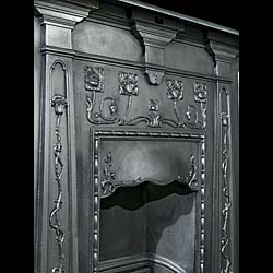 A Small Art Nouveau Cast Iron Fireplace