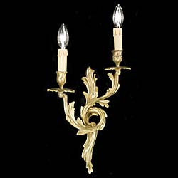  A 20th century pair of Rococo style wall lights   