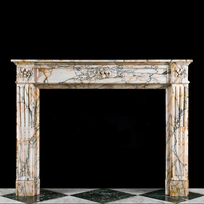  A Louis XVI Style Skyros Marble Fireplace 
