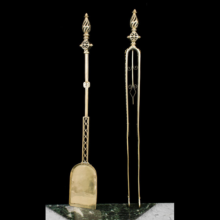  A Large Gothic Revival pair of brass firetools