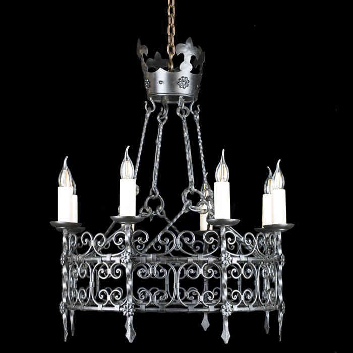 A Tudor Revival style iron chandelier