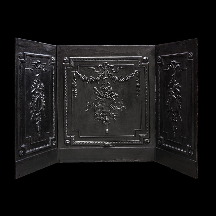 A Set of Louis XVI Cast Iron Fireplace Panels