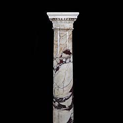 A Fleur-de-Peche marble pedestal column    