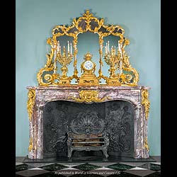 A Large Rococo Revival Overmantel Mirror