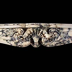 A large antique Rococo Sienna Claire marble fireplace surround    