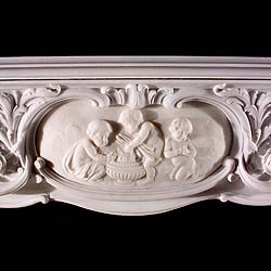 An antique Rococo Revival marble fireplace surround 