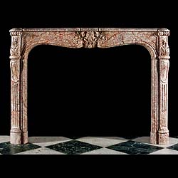 A replica Louis XV marble chimneypiece