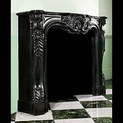 A Louis XV chimneypieces in namur black marble 