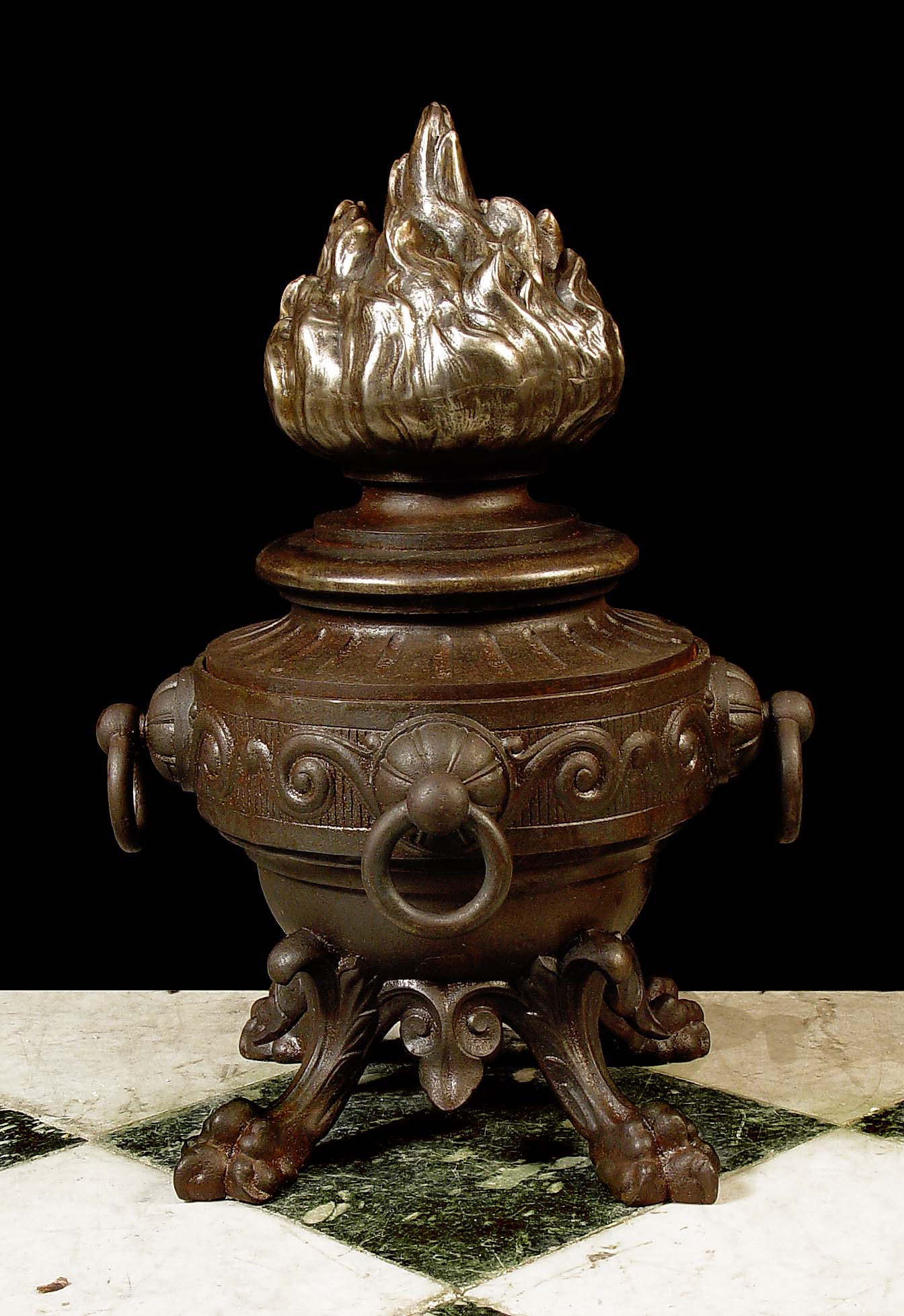  Antique Cast Iron Roman Manner Finial with Torchere decoration
 A large Antique Torchere Finial, Cast in Iron and supported on Lion Paw Feet. In the manner of the Roman Revival, French 19th Century.
