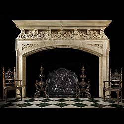 Antique Rare Renaissance Inglenook Fireplace in Limestone with ornate frieze 
 This very large limestone chimneypiece has an intricate frieze showing mythic figures, leaves and birds, surrounded by floral ornamentation. The spandrels show a wood nymph and a dolphin, surrounded by a perimeter of bellflowers and beading, with a wide arch with keystones.
