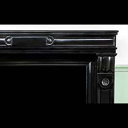 A smart antique Belgian Black marble Fireplace  surround in the Louis XVI manner 