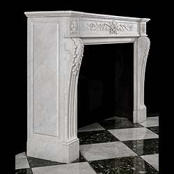 A Louis XVI style Antique marble fireplace surround