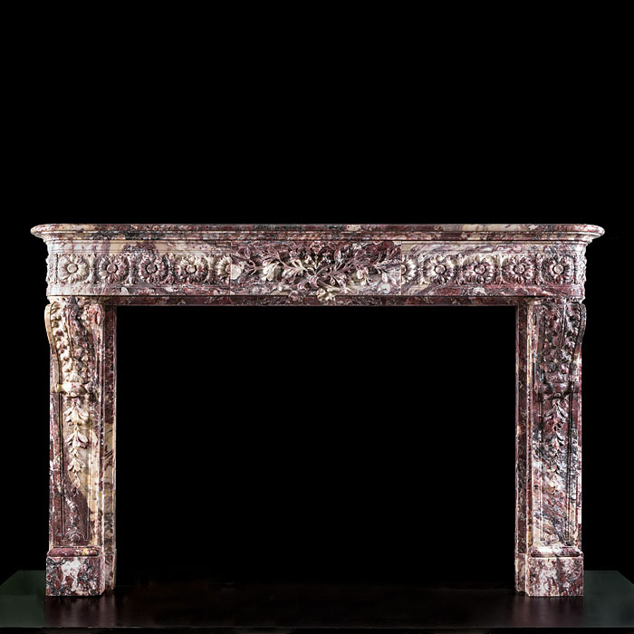 A beautiful antique Louis XVI Fleur de Pecher Cheminee Fireplace Surround