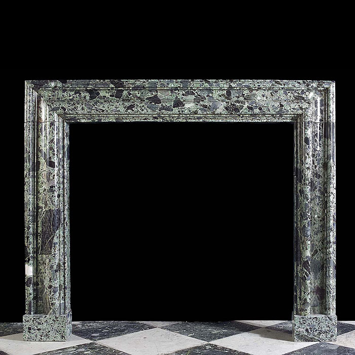 A 19th century Green Marble Bolection Chimneypiece 
