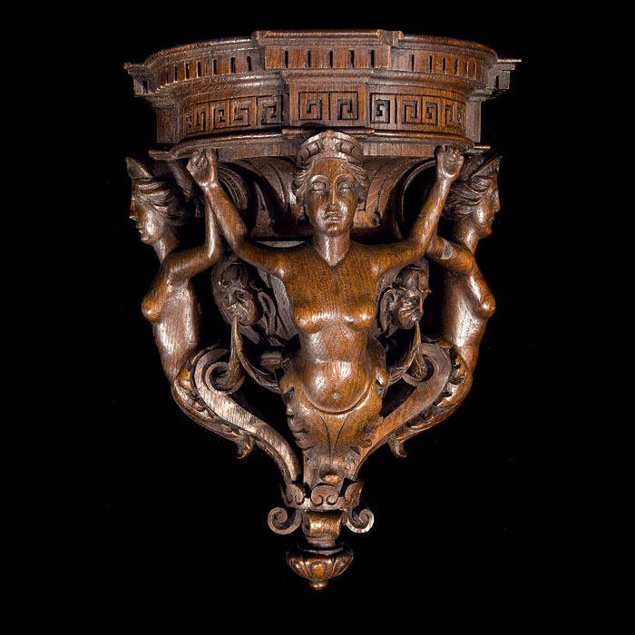 A renaissance style carved walnut wall bracket    