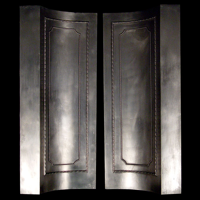 A Large Pair of Curved Fireplace Panels