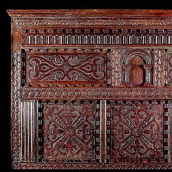 A large carved oak antique Jacobean overmantel panel    