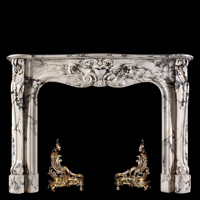  A French Rococo antique marble chimneypiece   