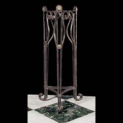  Antique Wrought Iron Gueridon in the Neo Classical style
 A Wrought Iron Plant Stand with Lion Mask in the manner of Neo Classicism, mounted on rosettes. 19th century.
