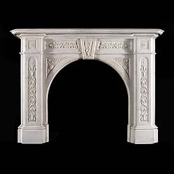 A Victorian statuary marble antique arched chimneypiece    