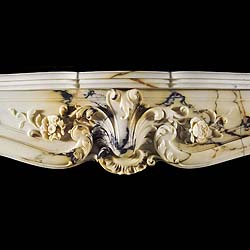  An antique French Rococo marble fireplace surround   