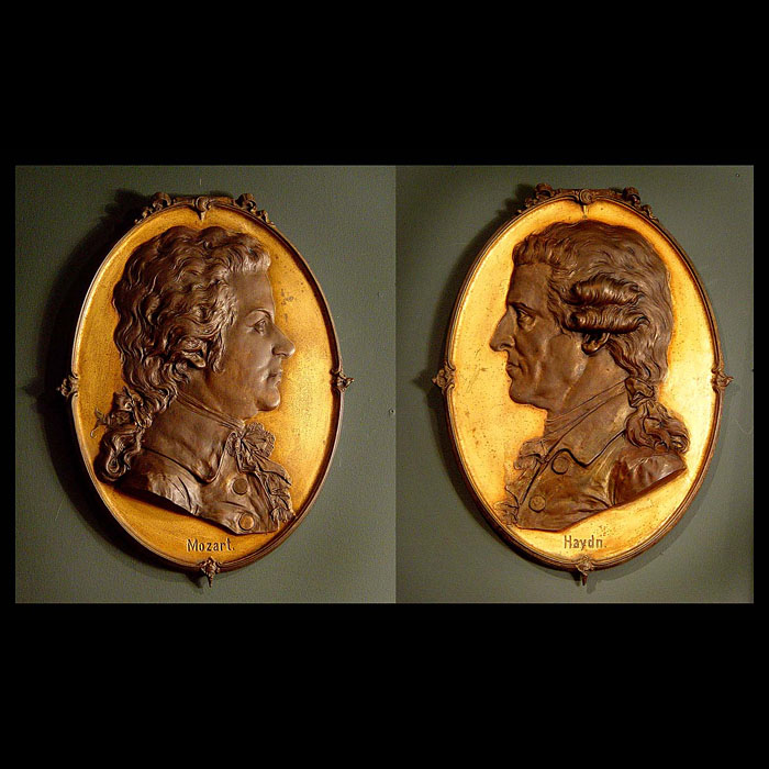 Antique Pair of Cast Iron relief Plaques depicting Haydn and Mozart in Frames
