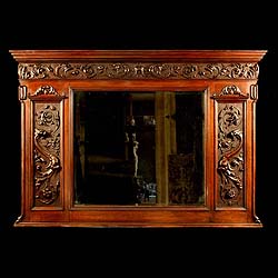 A Victorian carved oak antique over mantel mirror  