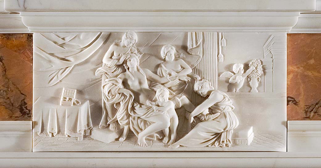 A 20th century decorative marble chimneypiece in the manner of Henry Cheere.