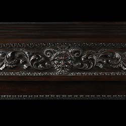A Rare Antique Louis XVI Ebony Coromandel Caryatid Fireplace Mantel
 An extraordinary and unique Louis XVI Regency tropical hardwood chimneypiece, in ebony coromandel wood. The frieze has ornate and intricately carved florally repeating decoration with a central Bacchus mask. The large satyrs are draped in lion skins with leaf adornment around their heads and waists.

