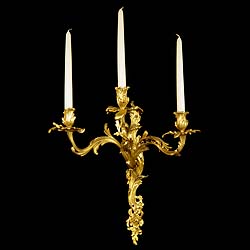 A pair of large Rococo style ormolu wall lights    