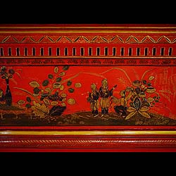 A red lacquered Chinoiserie antique fireplace surround    