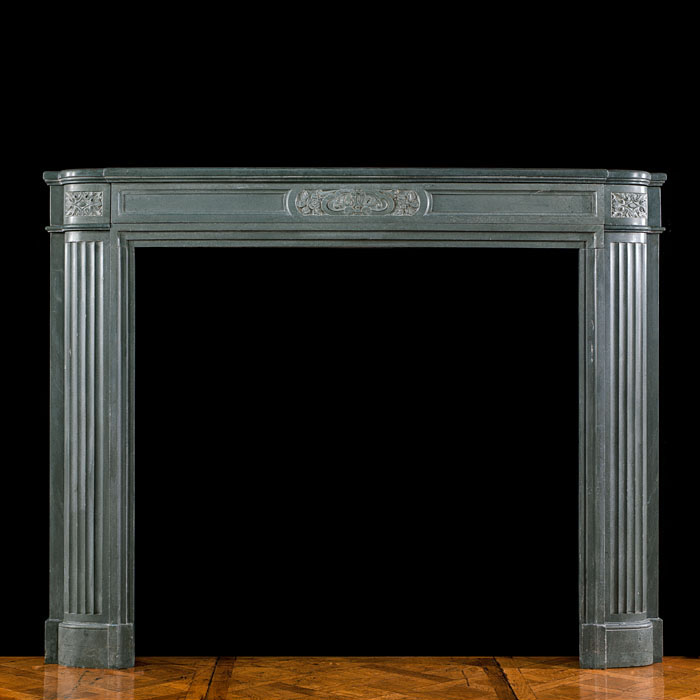 A stone chimneypiece of the Art Deco period 