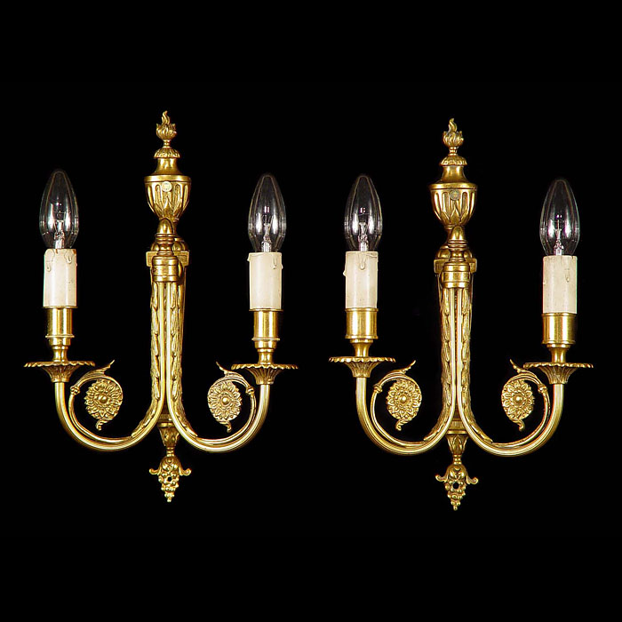 A pair of Regency style gilt bronze wall lights    
