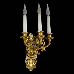 Small pair of three branch Louis XVI style wall lights    