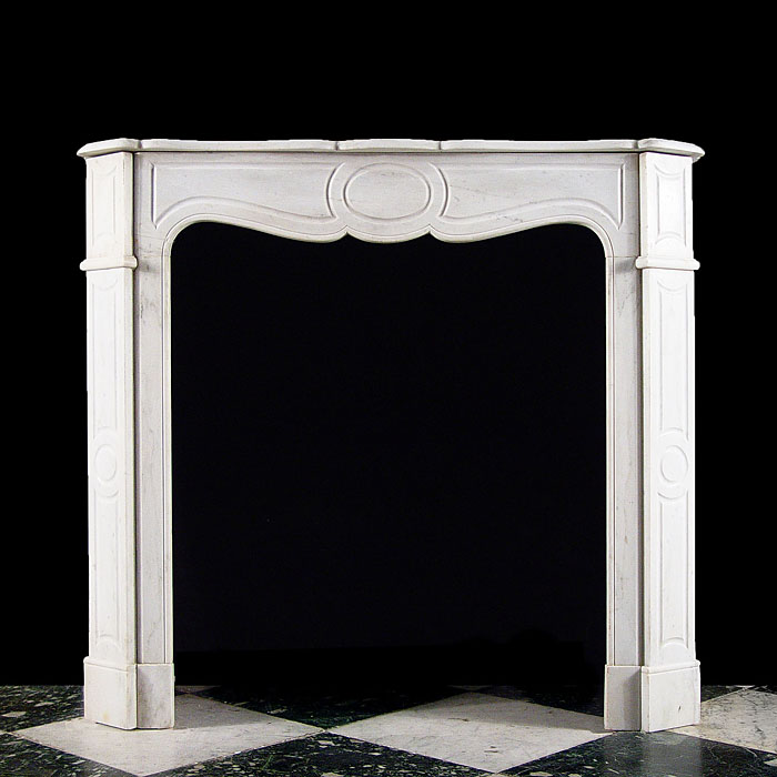 A Louis XV style Pompadour fireplace 