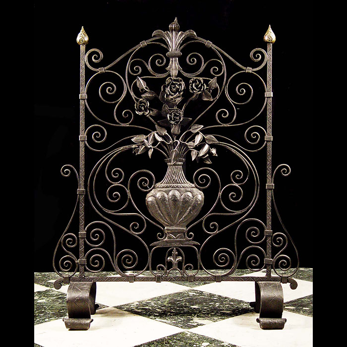 Antique Wrought Iron Fire Guard with central Urn 
