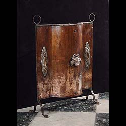A Copper Fire Guard with floral decoration, 1930
