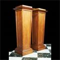 Large Arts & Crafts style tapering oak pedestals.