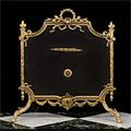 A gilt brass Louis XV style  firescreen
