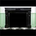 An antique French Regency black marble fireplace mantel.