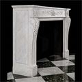 Antique fireplace mantel in the Louis XVI manner.