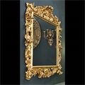 Antique English mirror, rococo in carved giltwood.