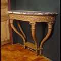 Antique carved wood console table in the Louis XVI style marble top.