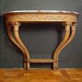 Antique carved wood console table in the Louis XVI style marble top.