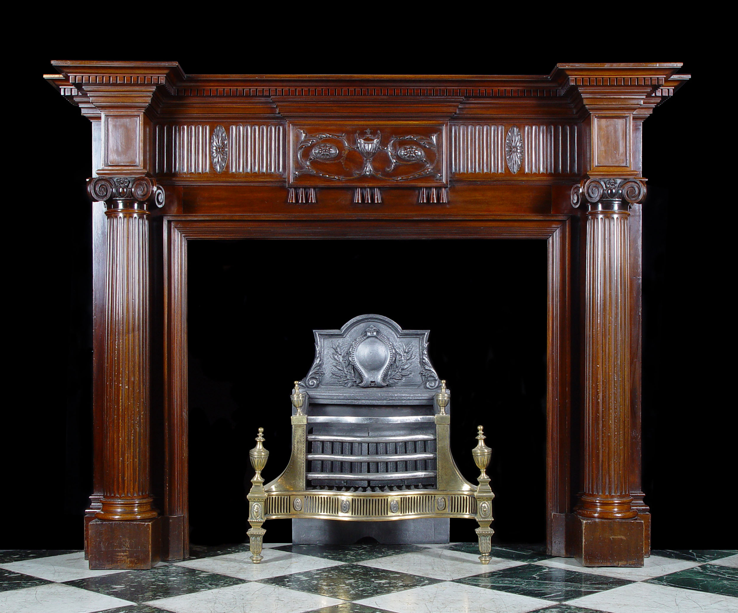 A Mahogany Georgian Adam Style Fireplace


