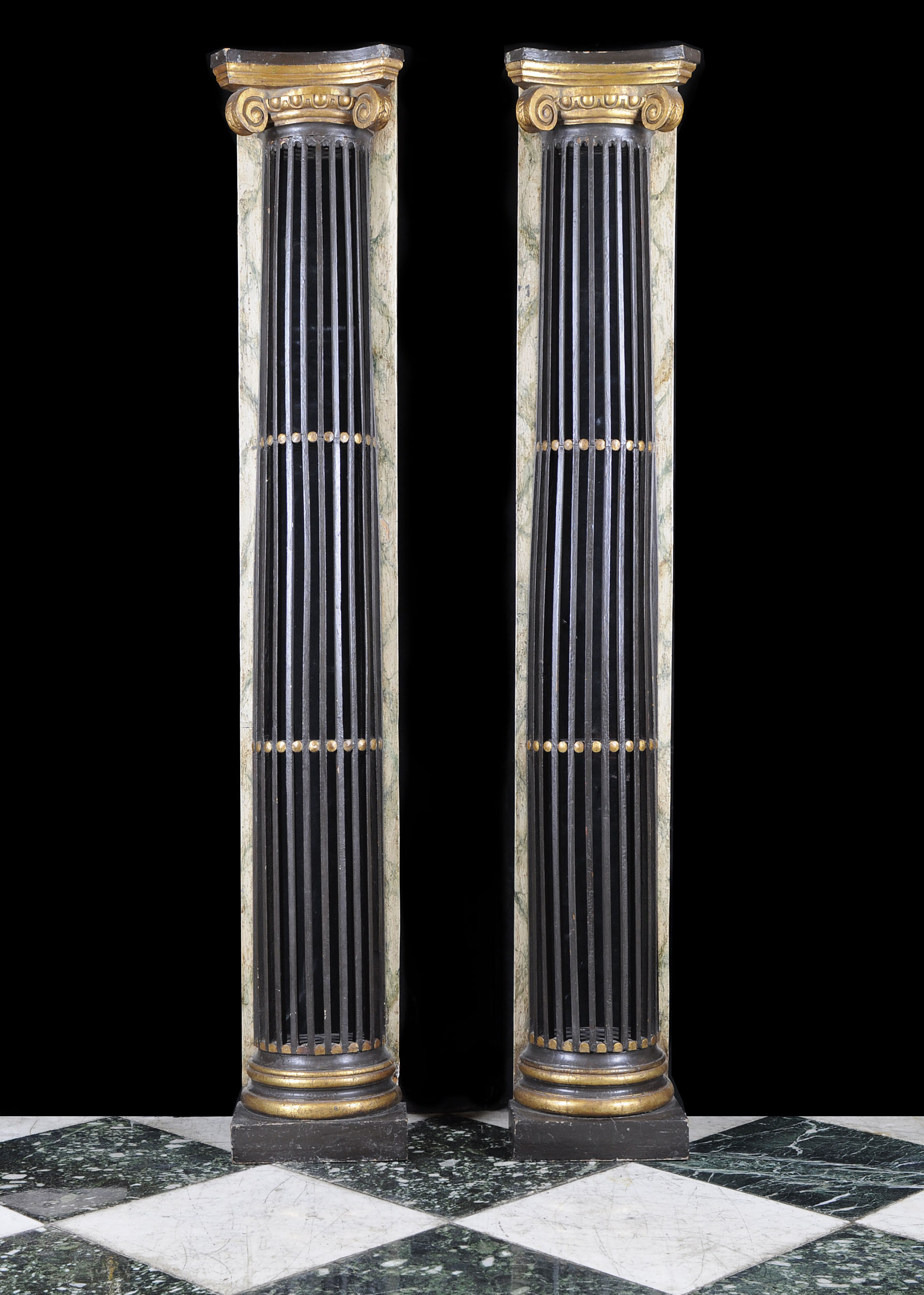 A Pair of Regency Ebonised Wood Columns