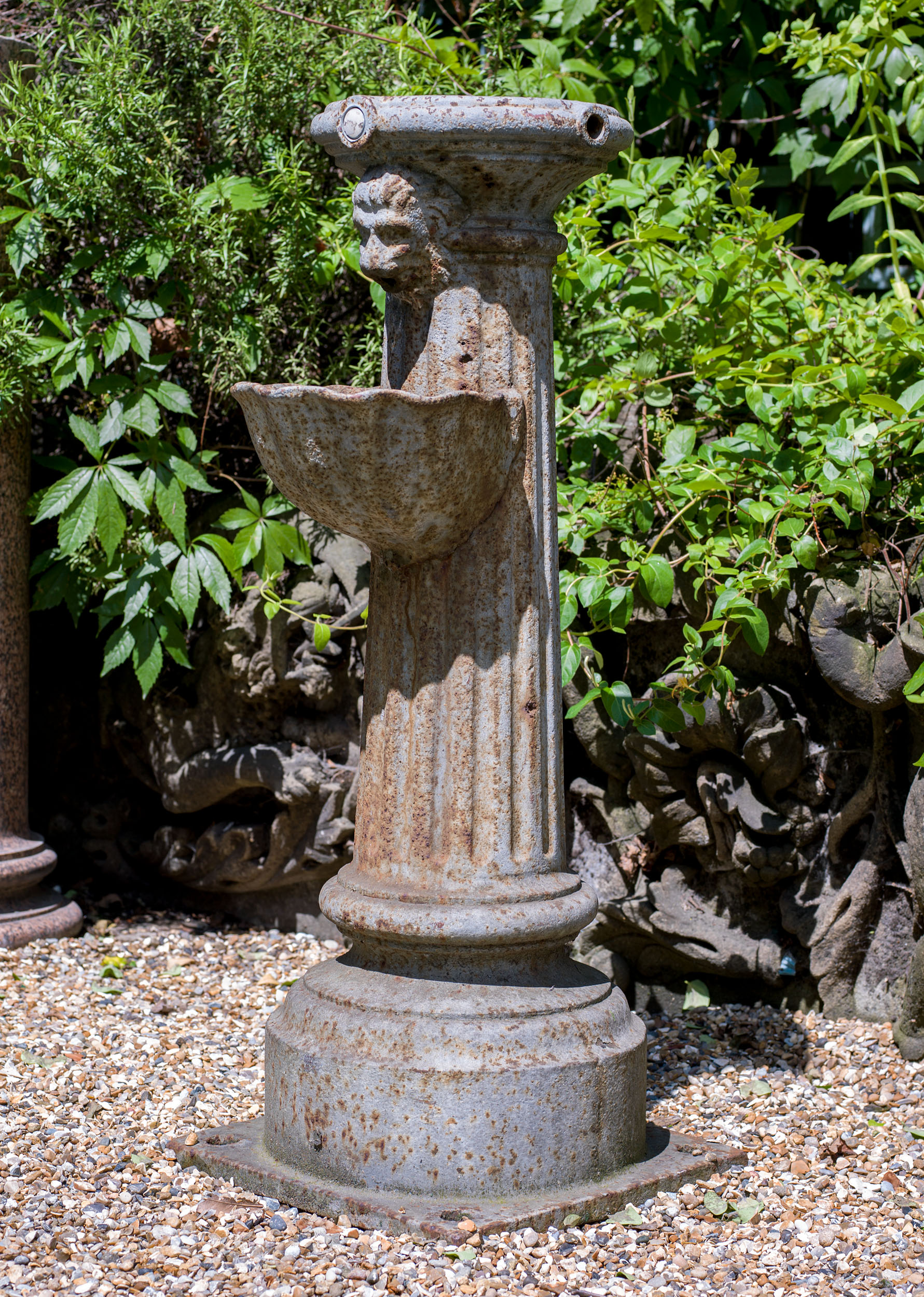 A Small Cast Iron Public Drinking Fountain