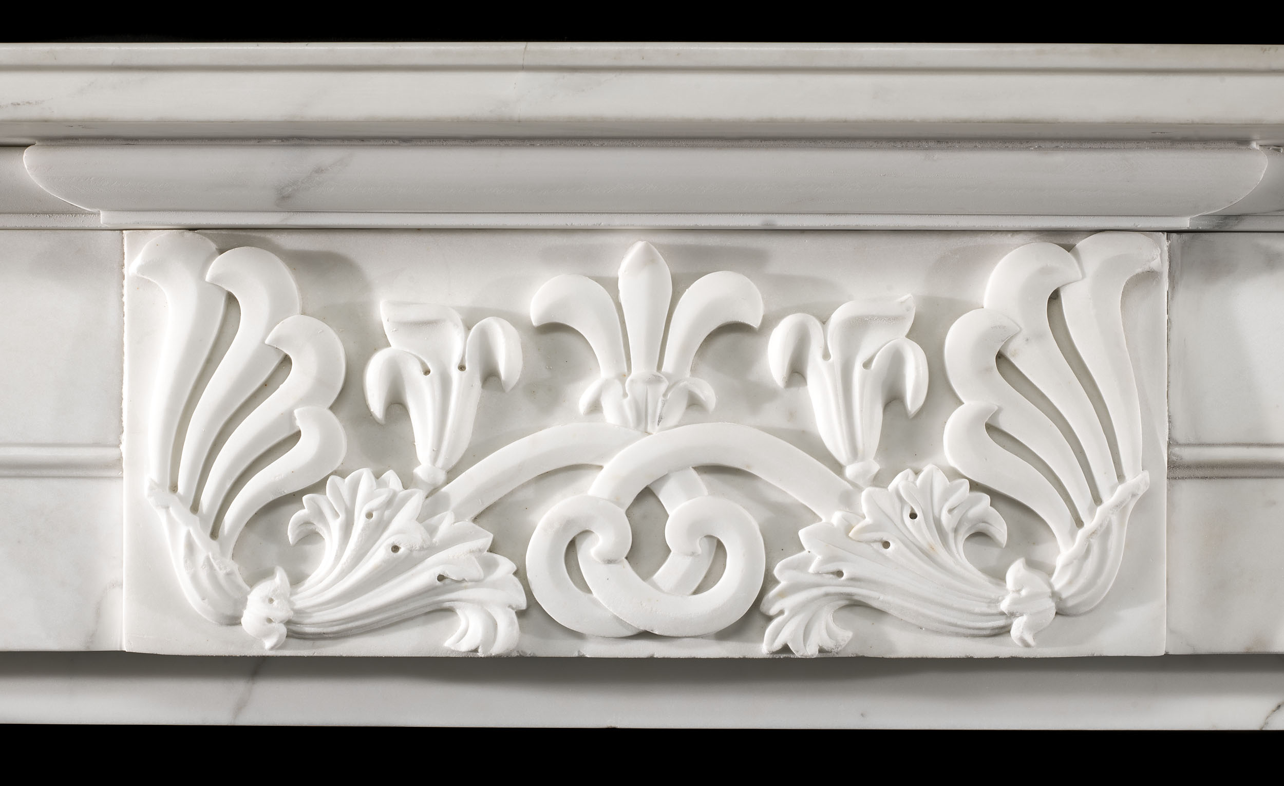 A Greek Revival Statuary Marble Fireplace